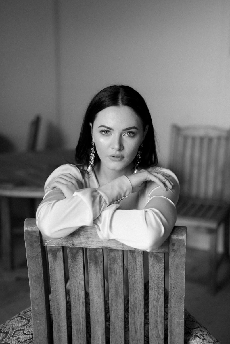 Mara Vellante in her studio, arms folded, looking directly at the camera.